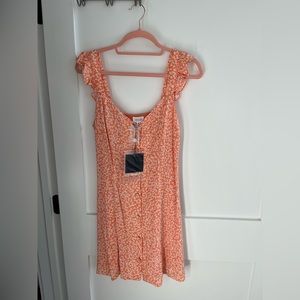 NEVER WORN orange floral mini dress with buttons down the front